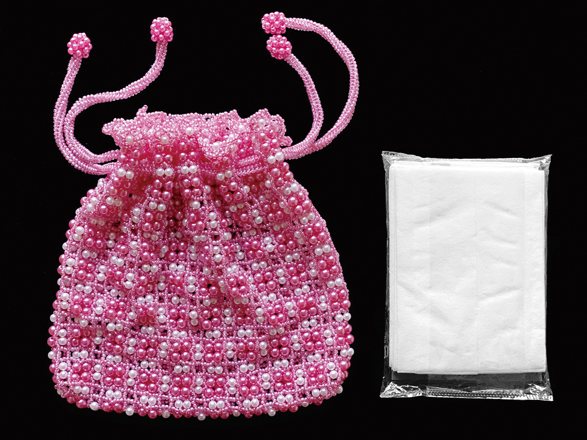 ピンクのパールビーズ編みミニ巾着袋